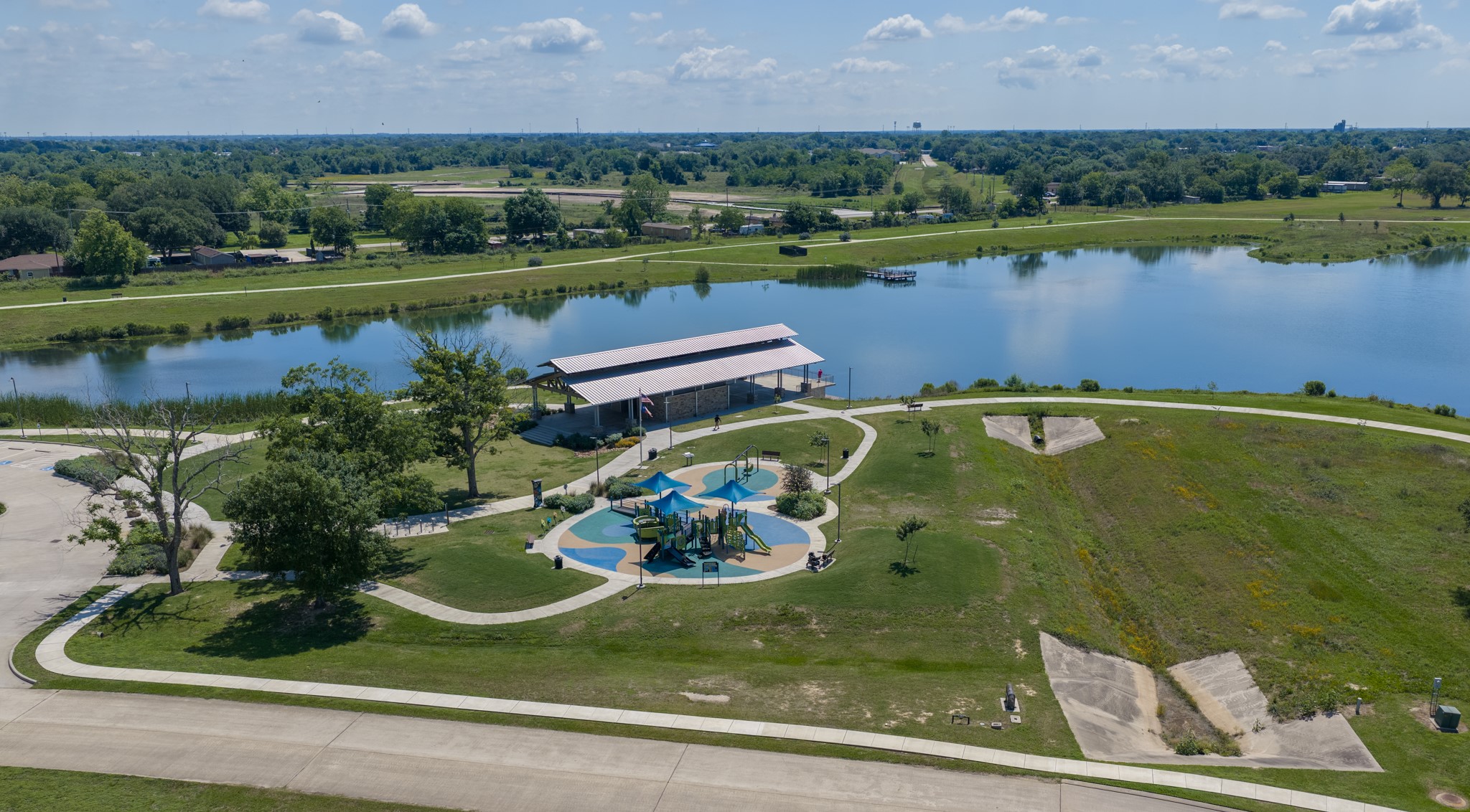 1283 Laurel Lane Angleton, TX 77515 - Photo 38 of 40 Amenities for the entire family to enjoy from the park area to the fishing pier. Drive out today and check out the area!