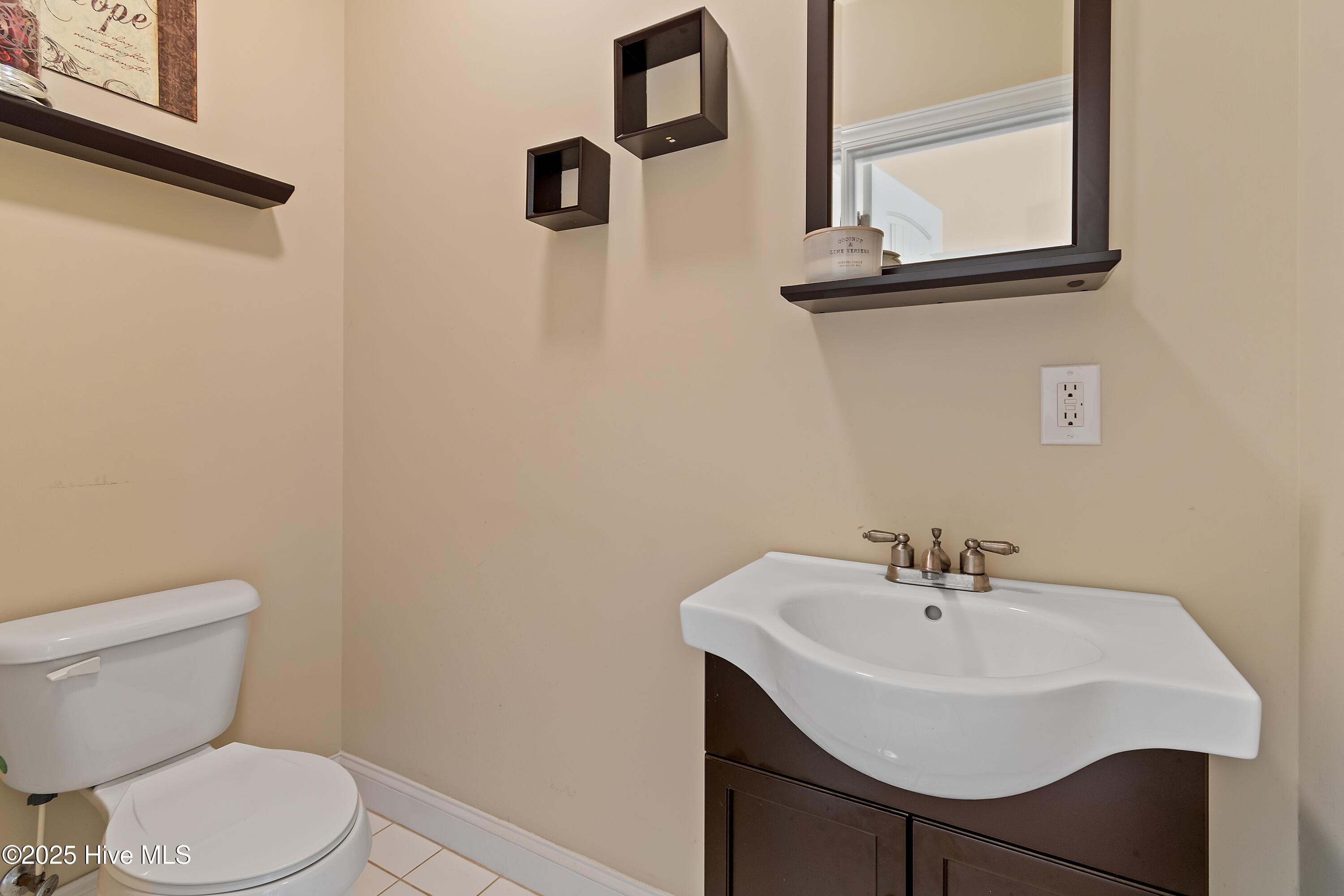 4377 Blacksmith Road Bolton, NC 28423 - Photo 46 of 72 Powder Bathroom off the garage