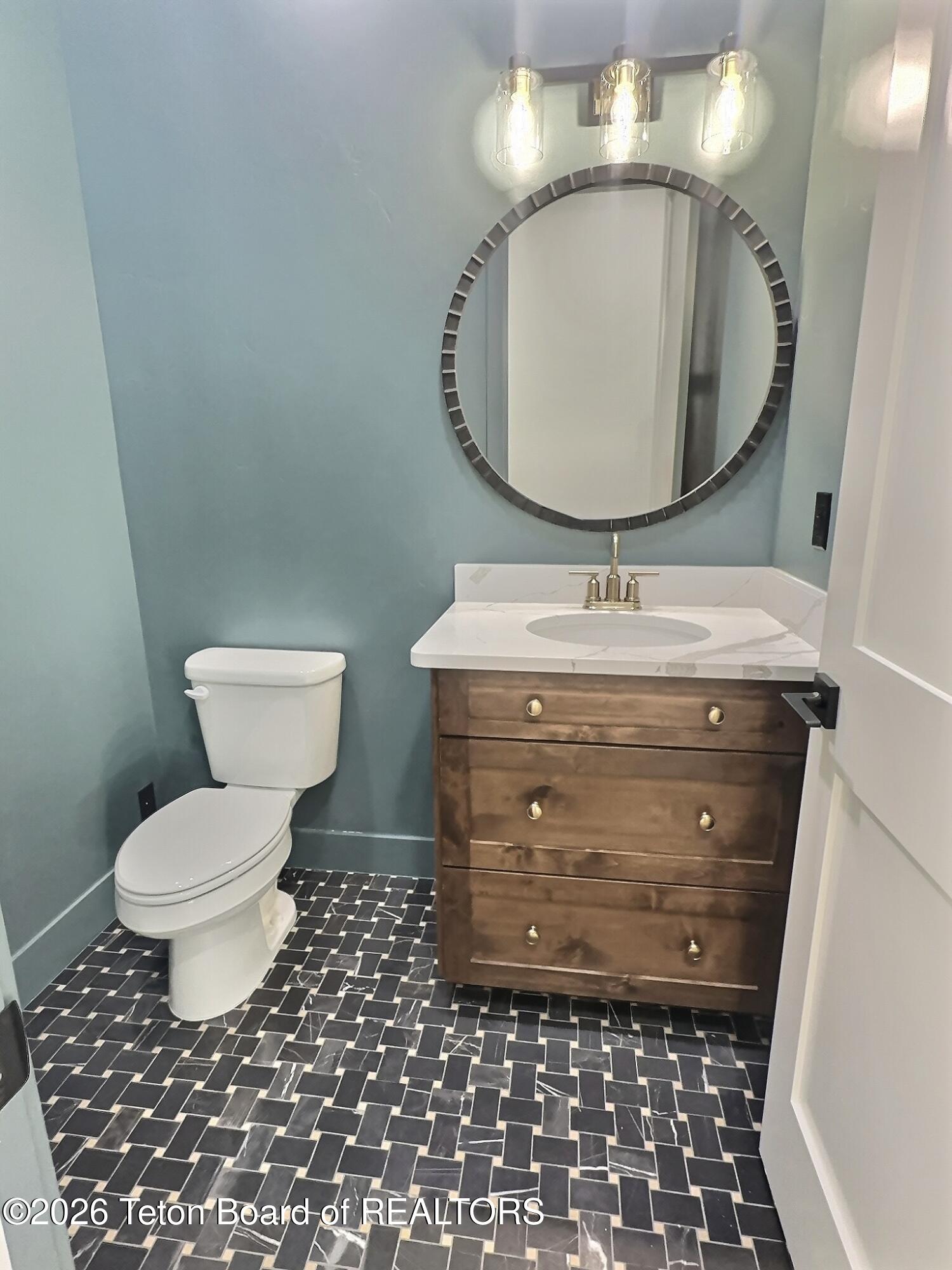 371 Desert Fox Lane Victor, ID 83455 - Photo 36 of 46 main floor powder room