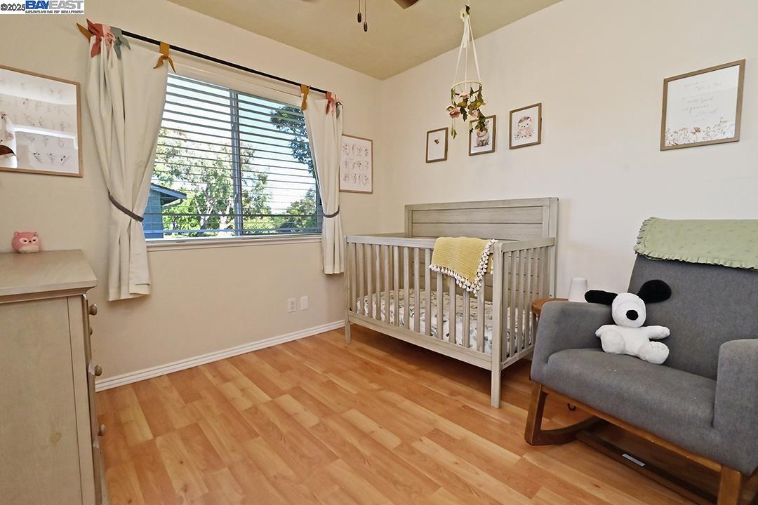 1031 Spring Valley Common Livermore, CA 94551 - Photo 14 of 26 a bedroom with furniture and a window