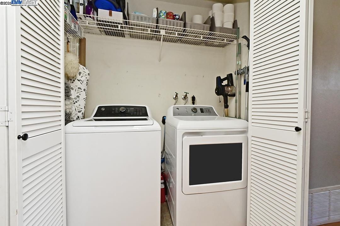 1031 Spring Valley Common Livermore, CA 94551 - Photo 18 of 26 a utility room with dryer and washer