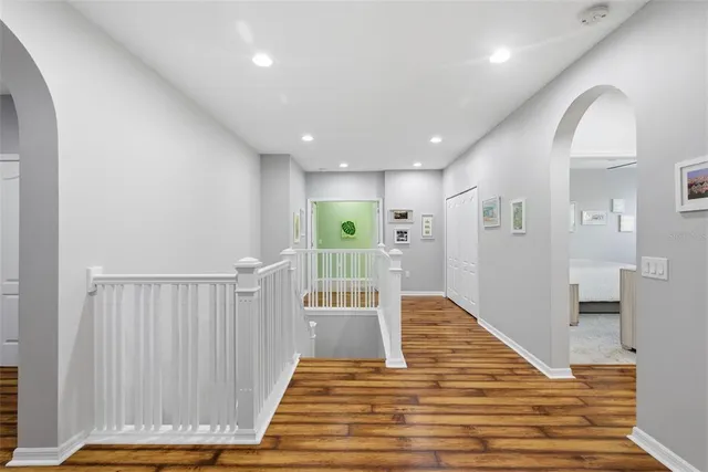 a swimming pool with outdoor seating and yard