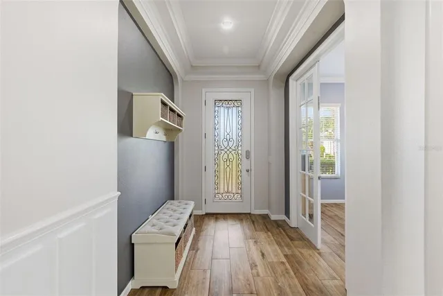 a kitchen with granite countertop a sink and cabinets