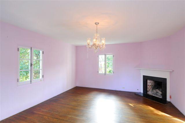 1098 Golf Road Santa Barbara, CA 93108 - Photo 5 of 9 a view of an empty room with a window and fireplace