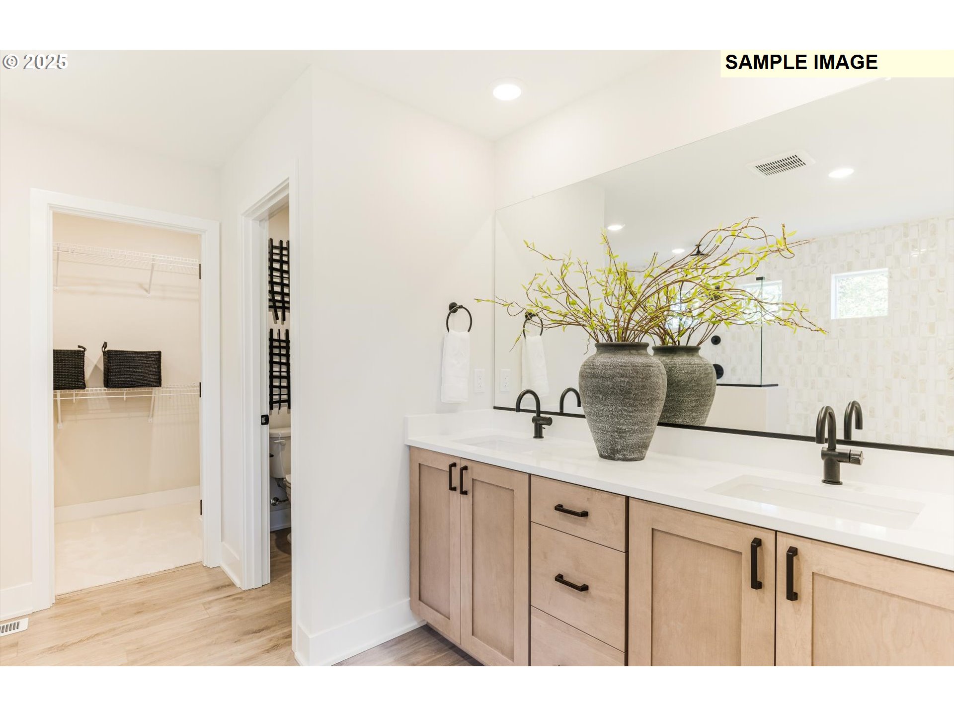 8701 South Schuster Way Ridgefield, WA 98642 - Photo 15 of 23 a bathroom with a sink and mirror