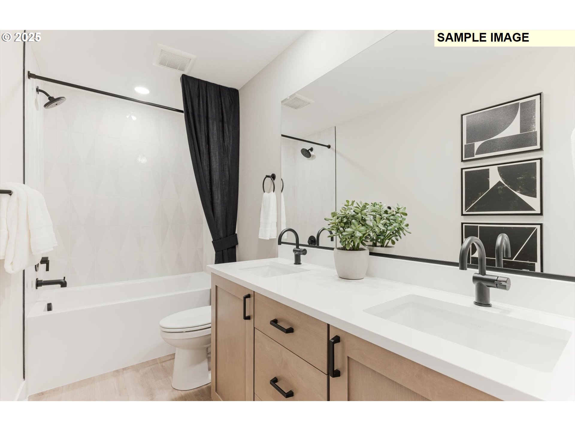 8701 South Schuster Way Ridgefield, WA 98642 - Photo 18 of 23 a bathroom with a sink a toilet a tub and shower