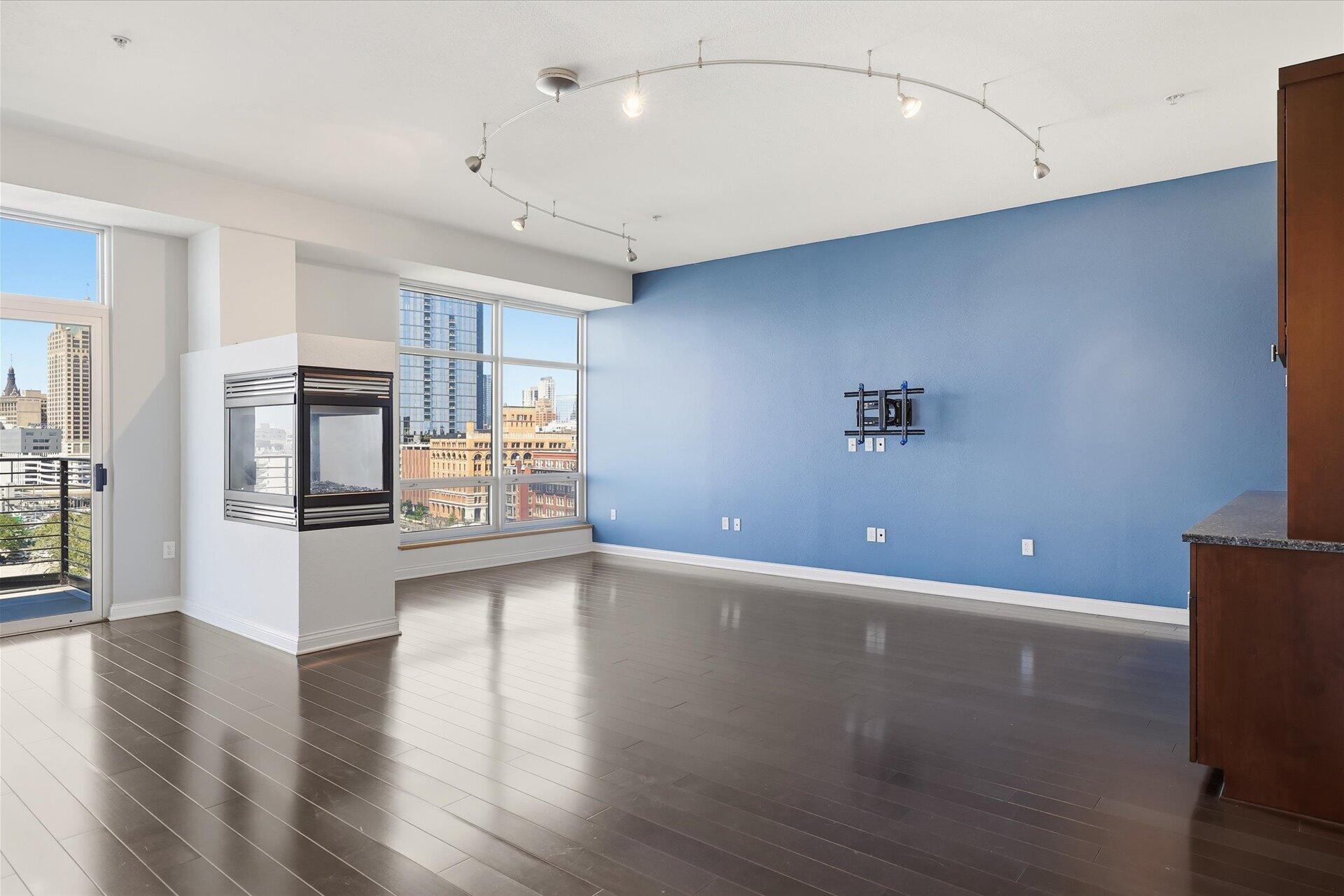 106 West Seeboth Street, Unit 920 Milwaukee, WI 53204 - Photo 10 of 51 10 foot ceilings, hardwood floors, Gas Fireplace