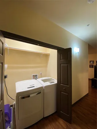 a utility room with washer and dryer