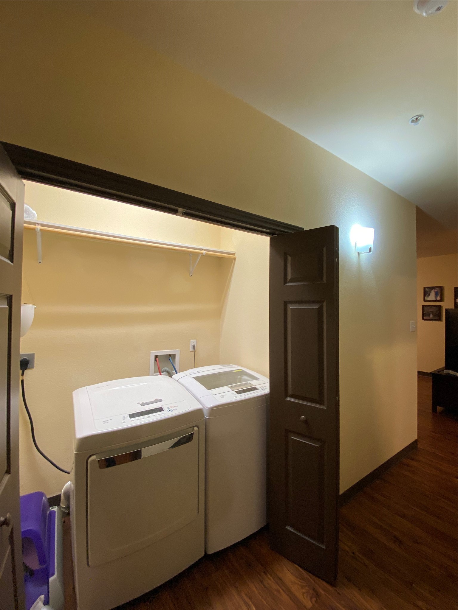 1239 20th Street, Unit B Huntsville, TX 77340 - Photo 16 of 17 a utility room with washer and dryer