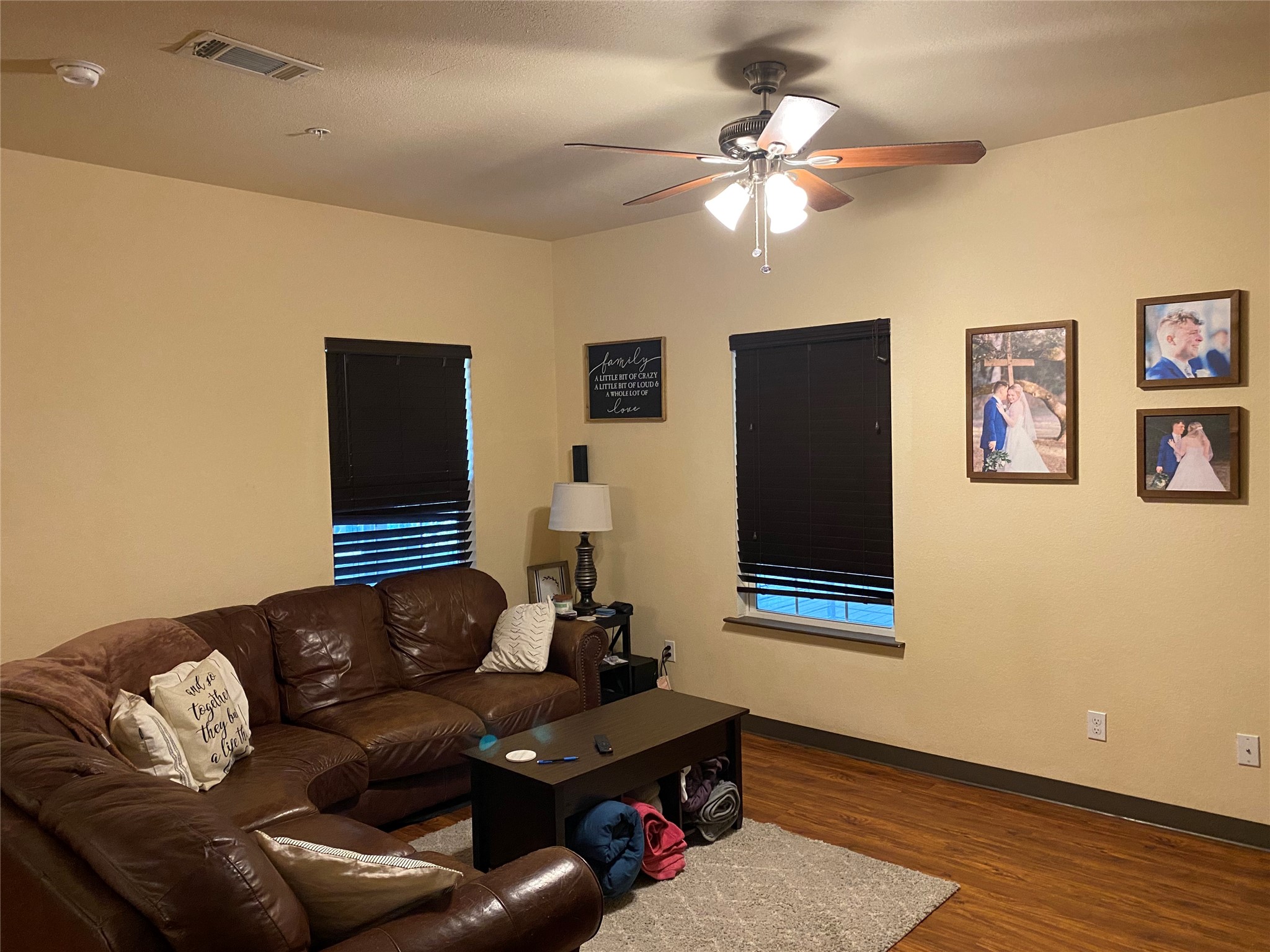 1239 20th Street, Unit B Huntsville, TX 77340 - Photo 6 of 17 a living room with furniture and a flat screen tv