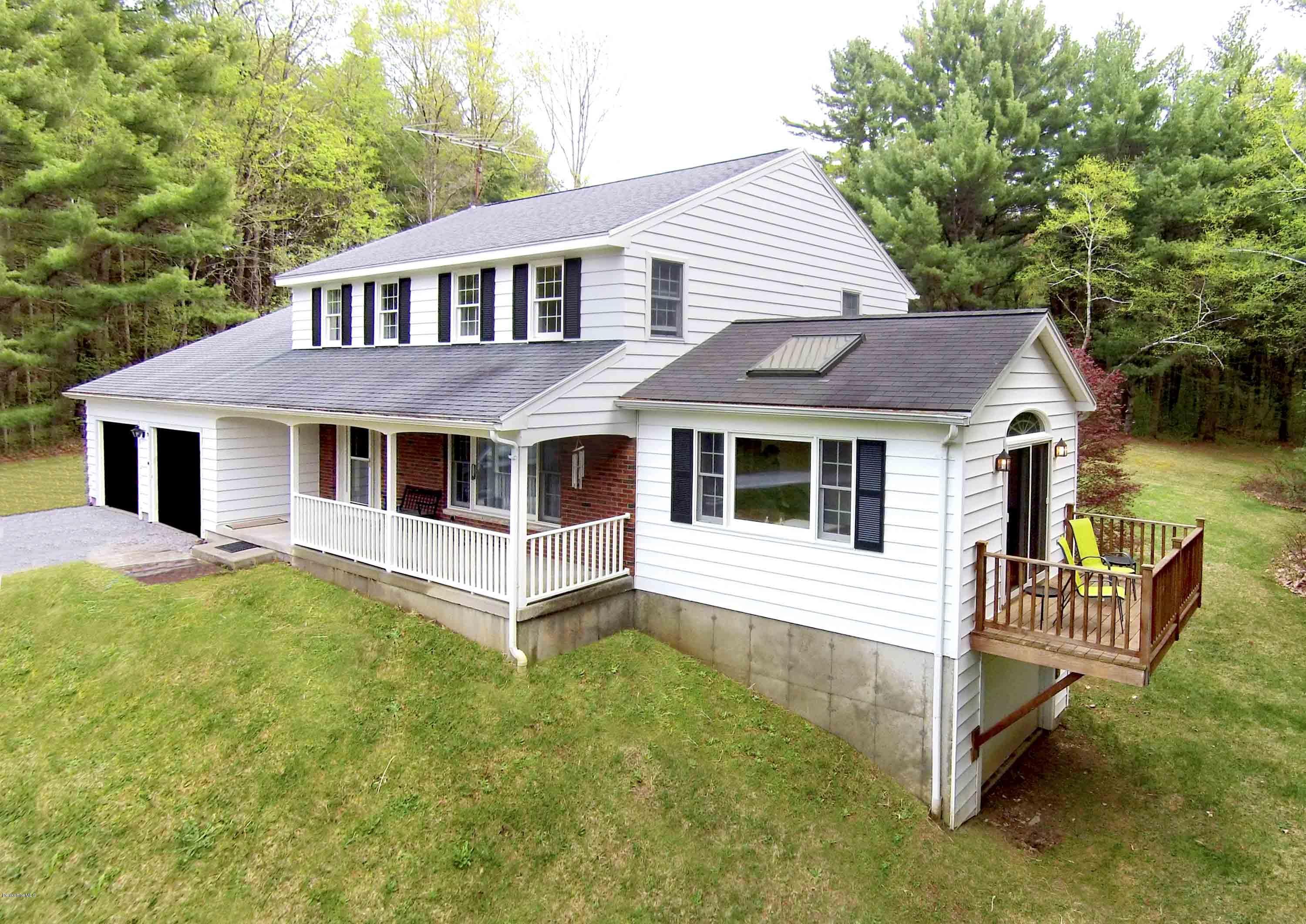 350 Lenox Road Richmond, MA 01254 - Photo 3 of 30 a aerial view of a house with a yard and deck