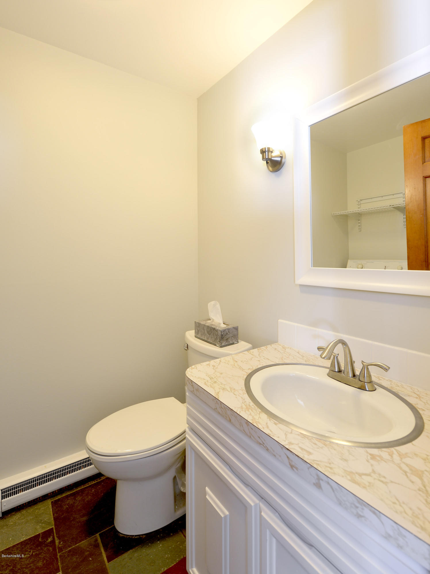350 Lenox Road Richmond, MA 01254 - Photo 24 of 30 a bathroom with a sink a toilet and mirror