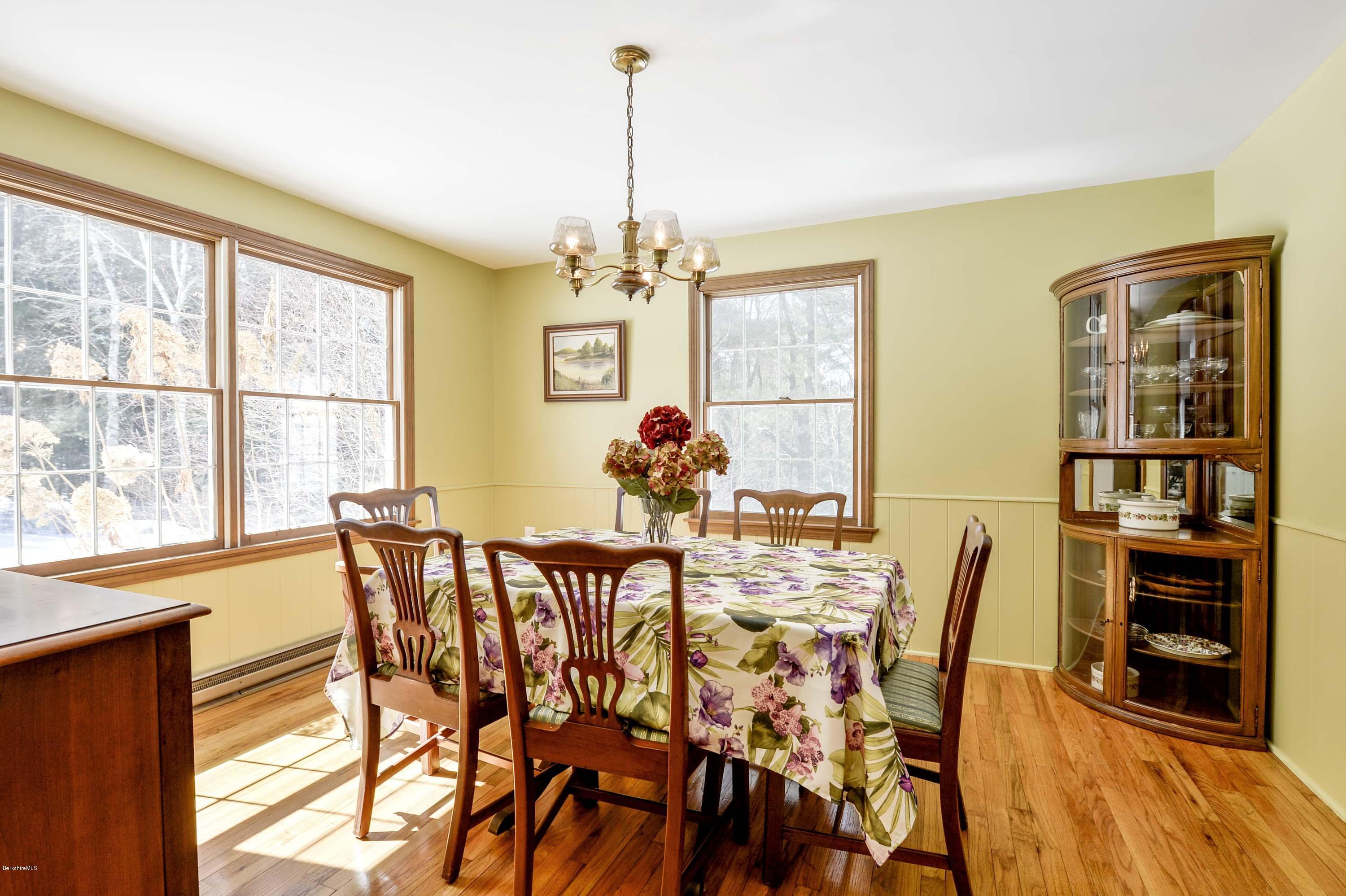 350 Lenox Road Richmond, MA 01254 - Photo 9 of 30 a view of a dining room with furniture and chandelier