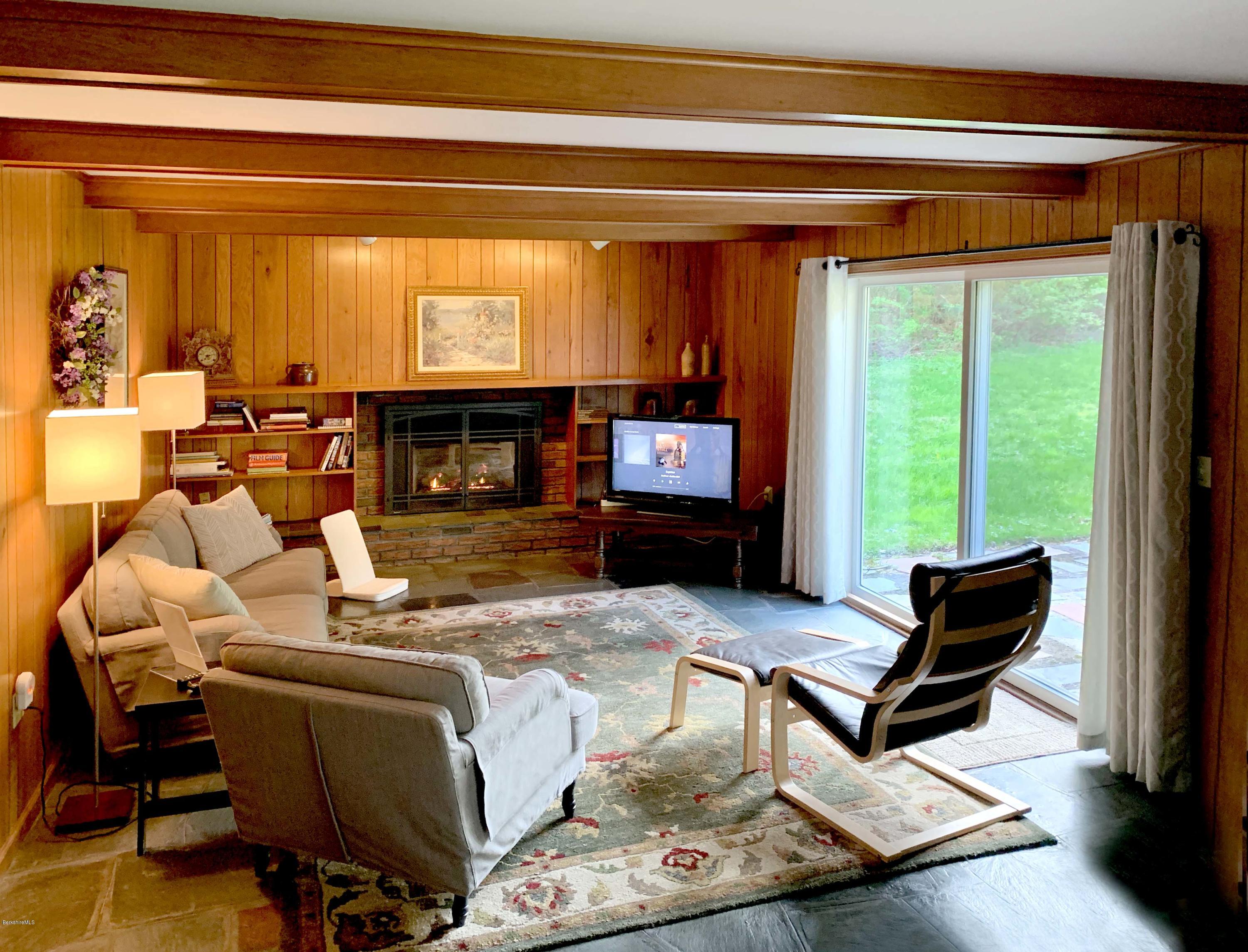 350 Lenox Road Richmond, MA 01254 - Photo 10 of 30 a living room with furniture and a fireplace