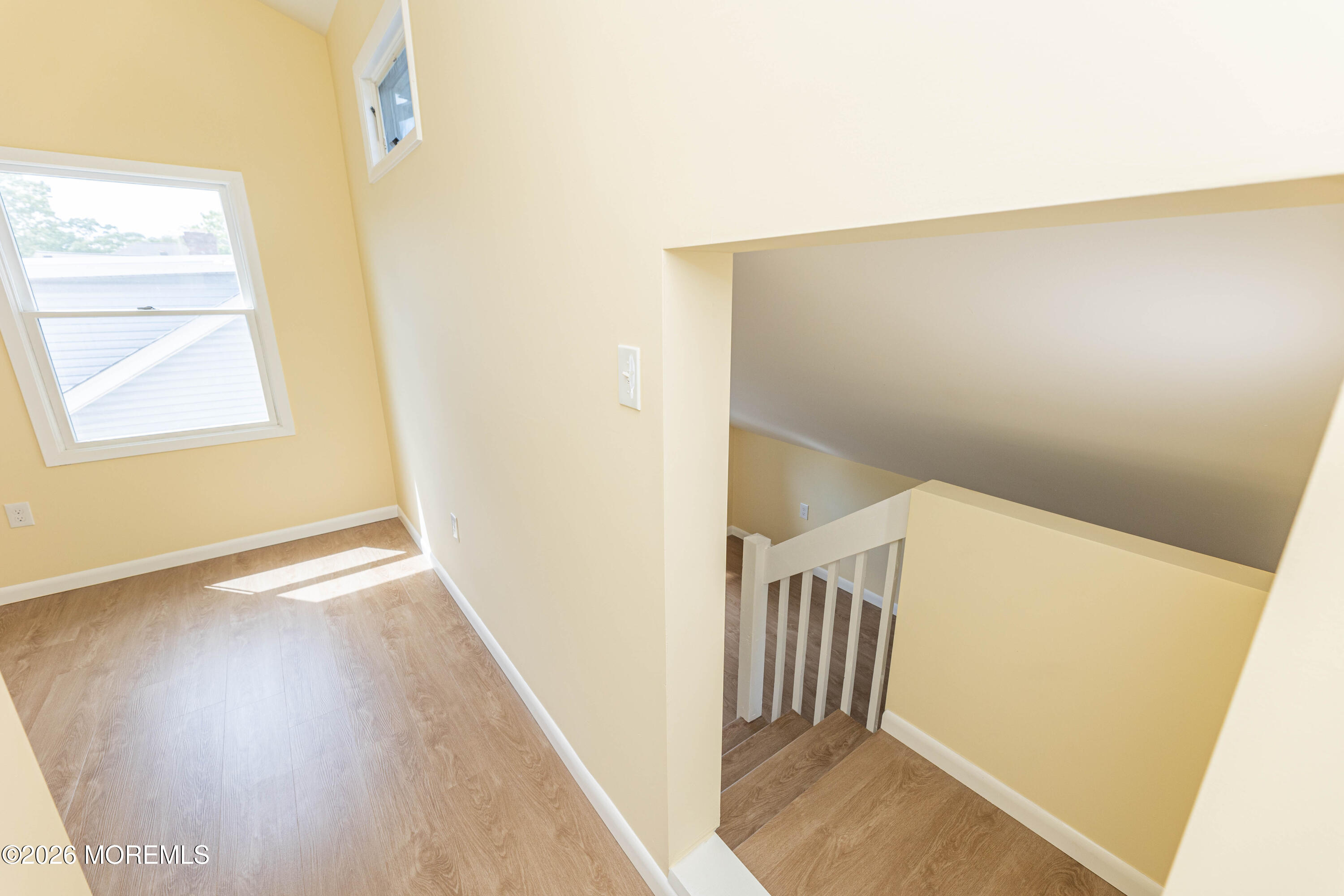 2408 Herbertsville Road Point Pleasant, NJ 08742 - Photo 64 of 82 a view of hallway with stairs and wooden floor