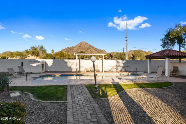 a view of a house with swimming pool