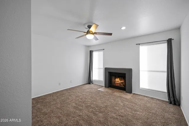 a view of a room with a fireplace