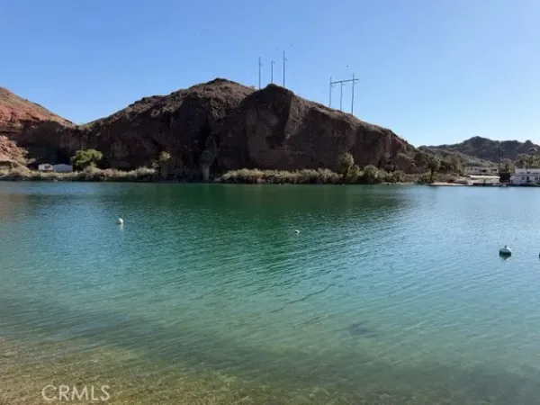 a view of a lake with a mountain in the background