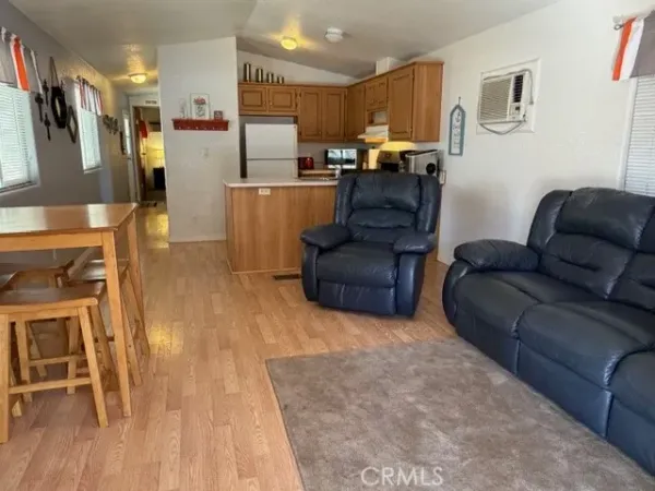 a stove top oven sitting inside of a kitchen