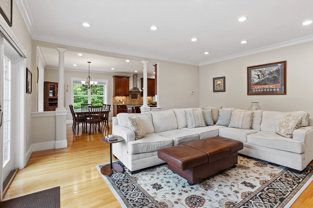 57 Sunset Ridge Lane, Unit 57 Bolton, MA 01740 - Photo 13 of 42 a living room with furniture and a rug