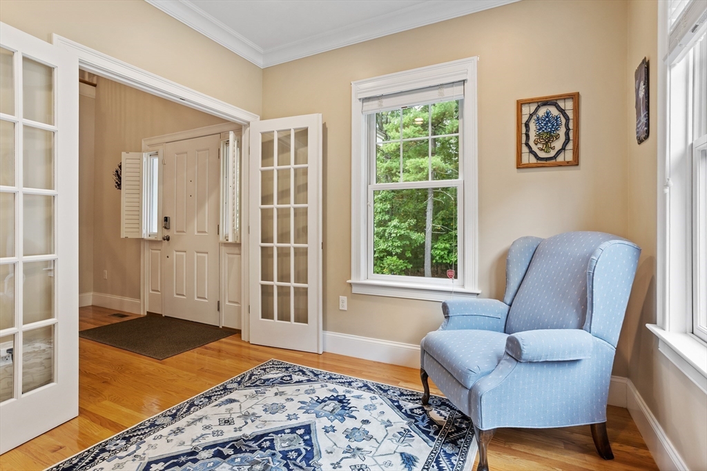 57 Sunset Ridge Lane, Unit 57 Bolton, MA 01740 - Photo 15 of 42 a bedroom with furniture and a rug