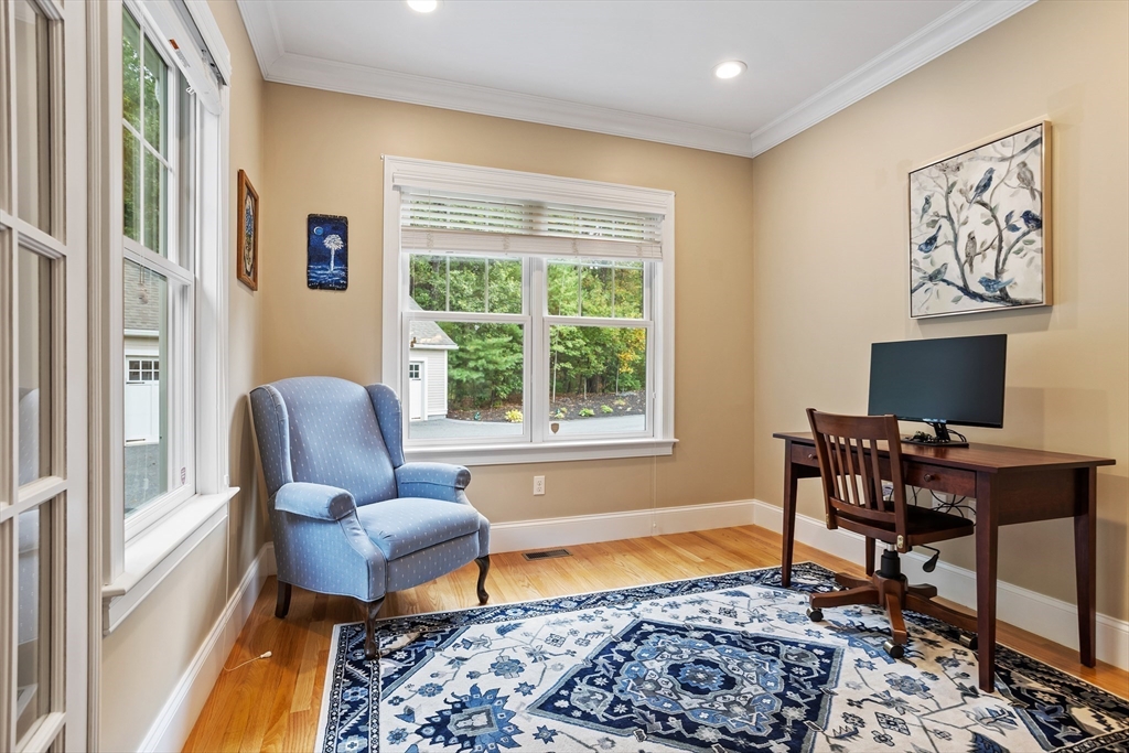 57 Sunset Ridge Lane, Unit 57 Bolton, MA 01740 - Photo 16 of 42 a living room with furniture and a window