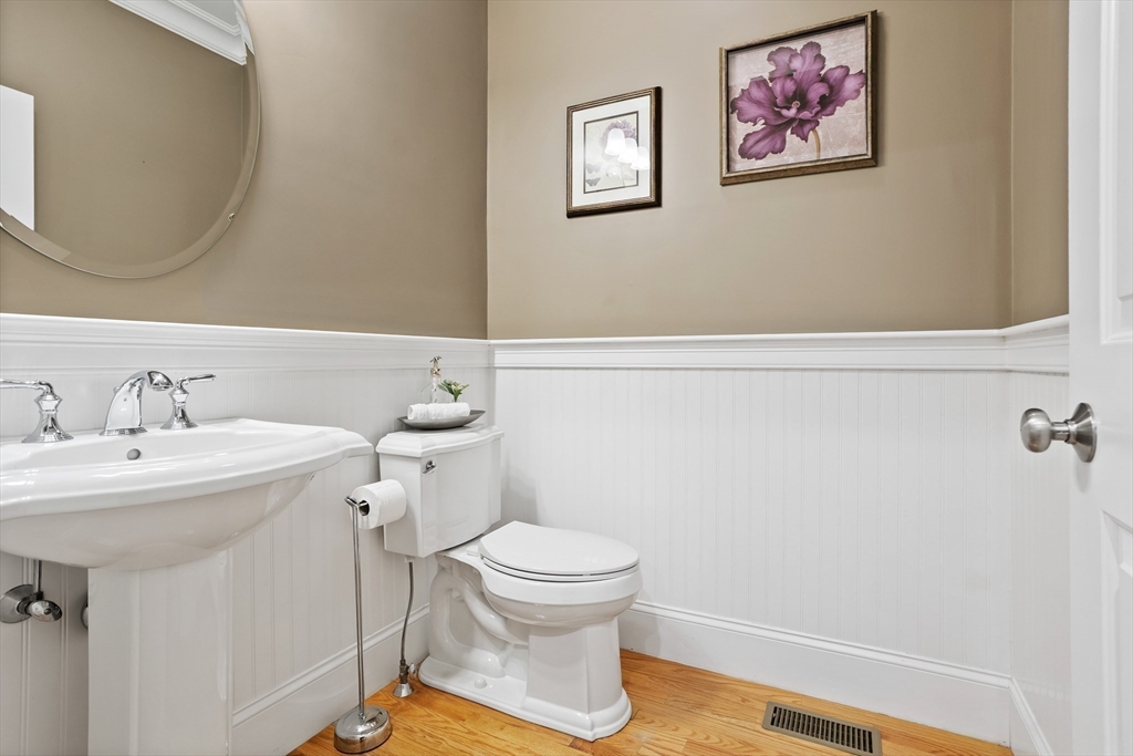 57 Sunset Ridge Lane, Unit 57 Bolton, MA 01740 - Photo 17 of 42 a bathroom with a sink and a toilet