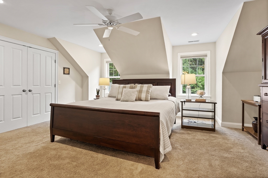 57 Sunset Ridge Lane, Unit 57 Bolton, MA 01740 - Photo 27 of 42 a bedroom with a bed and a window