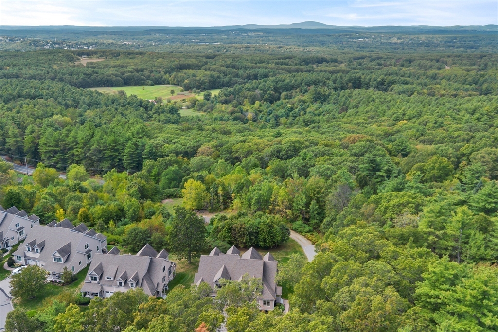 57 Sunset Ridge Lane, Unit 57 Bolton, MA 01740 - Photo 41 of 42 an aerial view of residential house with outdoor space
