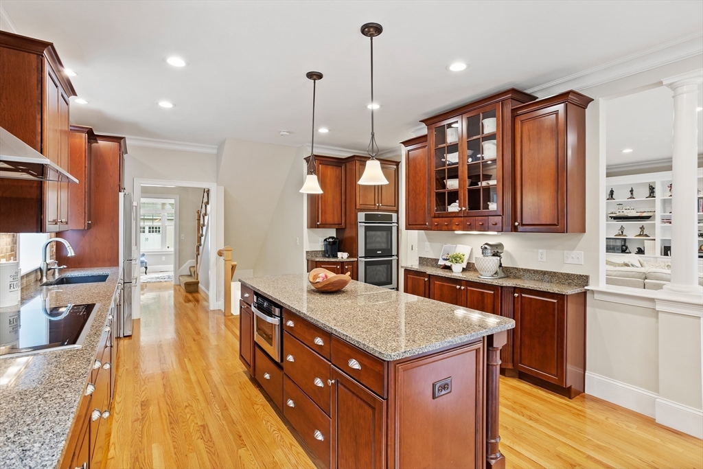 57 Sunset Ridge Lane, Unit 57 Bolton, MA 01740 - Photo 5 of 42 a kitchen with a sink a counter space appliances and cabinets