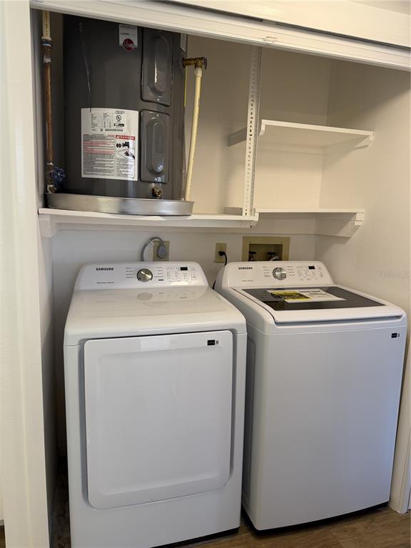 2004 Longpointe Circle Venice, FL 34293 - Photo 41 of 54 a utility room with dryer and washer