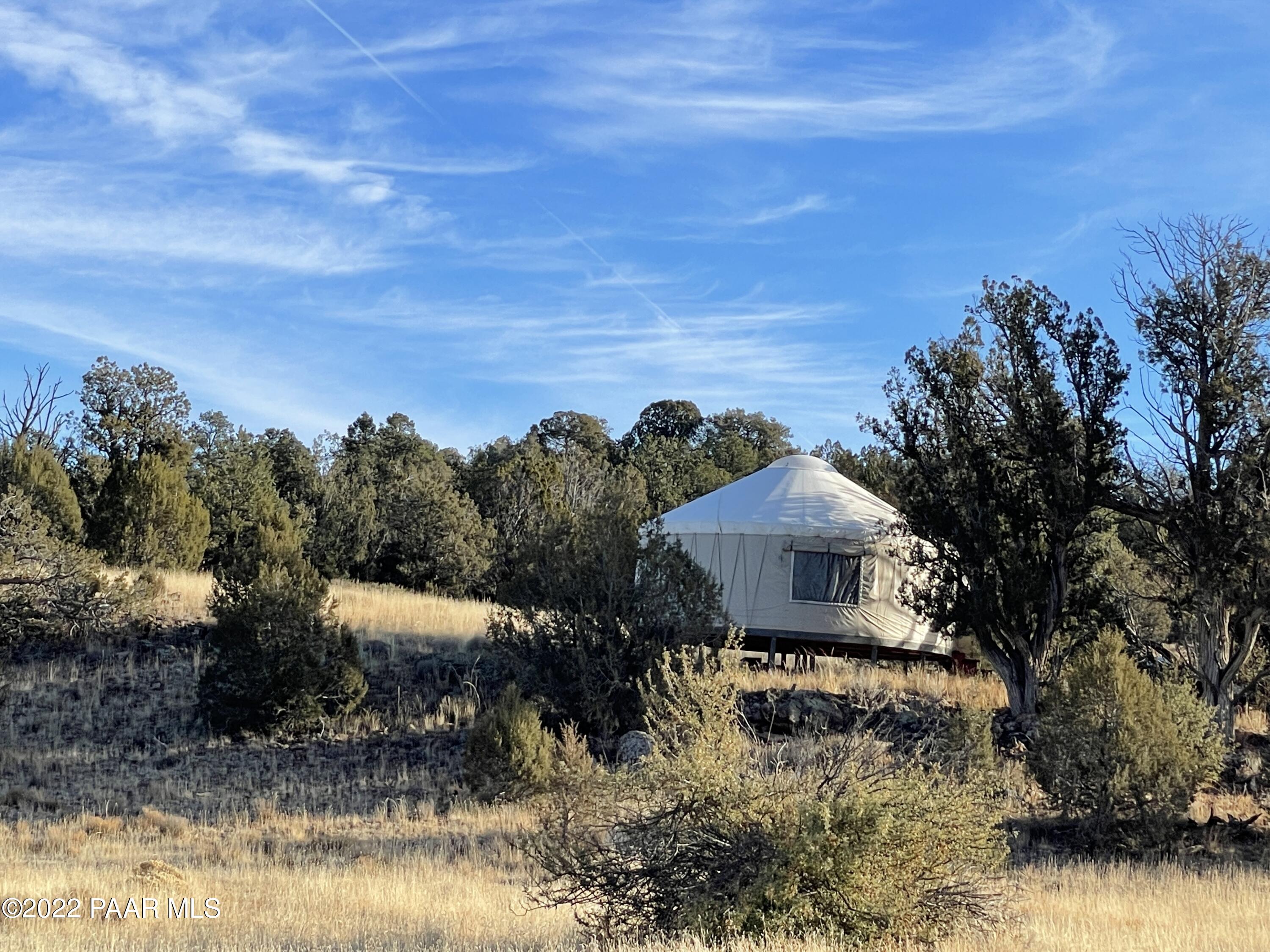 0 Wooden Ear Ranch Road Seligman, AZ 86337 - Photo 1 of 22 a front view of a house with a yard