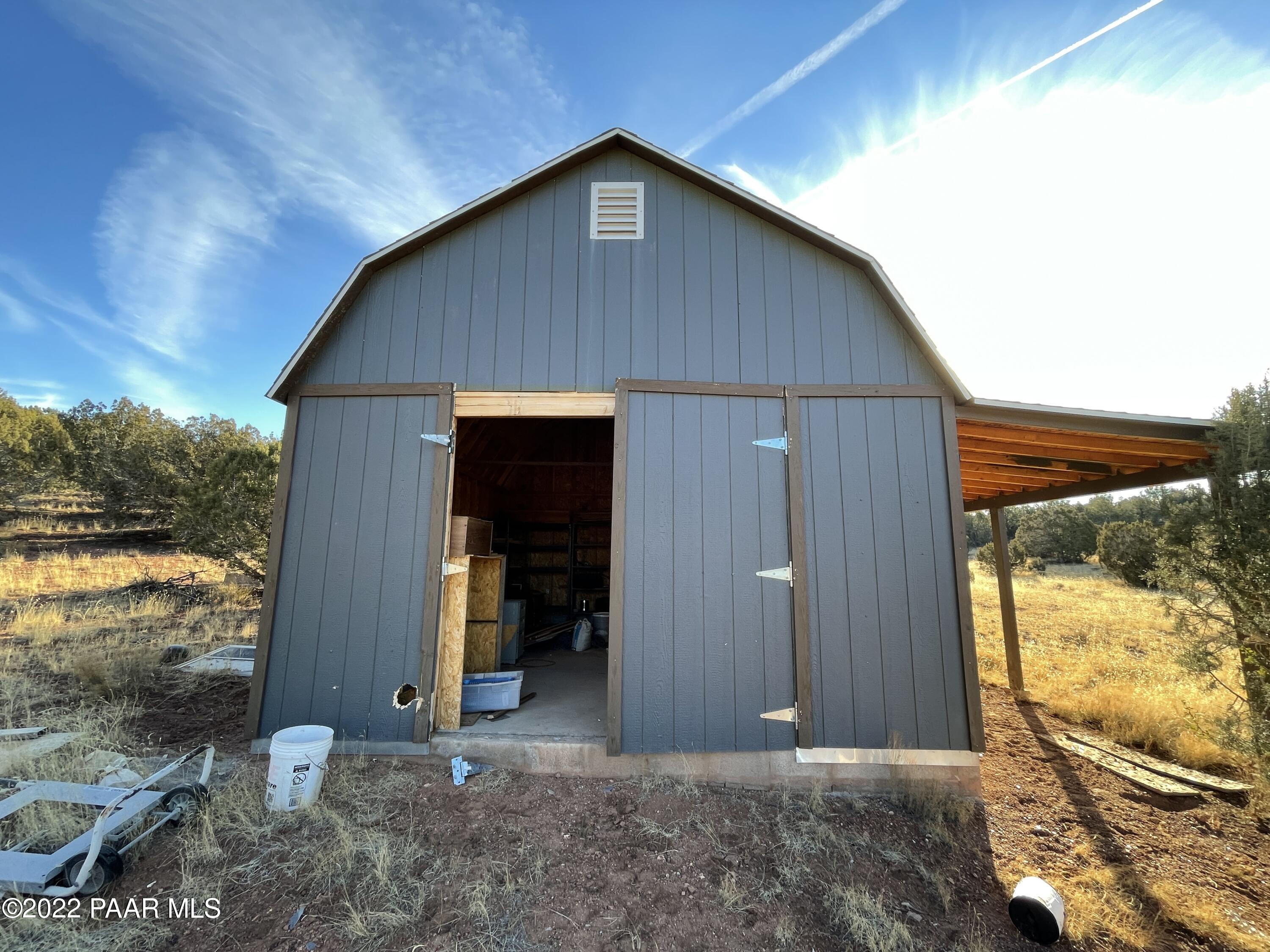 0 Wooden Ear Ranch Road Seligman, AZ 86337 - Photo 16 of 22 a front view of a house