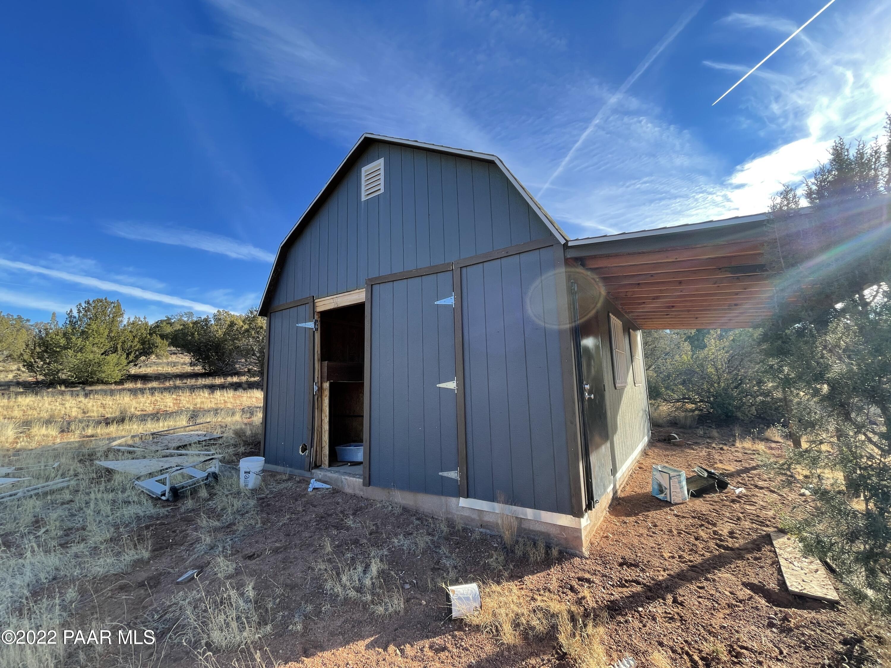 0 Wooden Ear Ranch Road Seligman, AZ 86337 - Photo 17 of 22 a backyard of a house with lots of green space