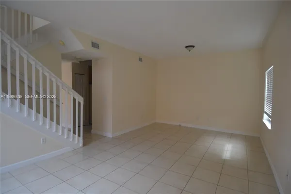 a view of an entryway with stairs