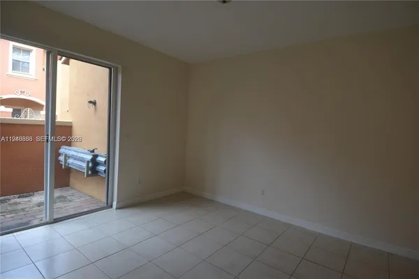 a view of a room that has a bench in it