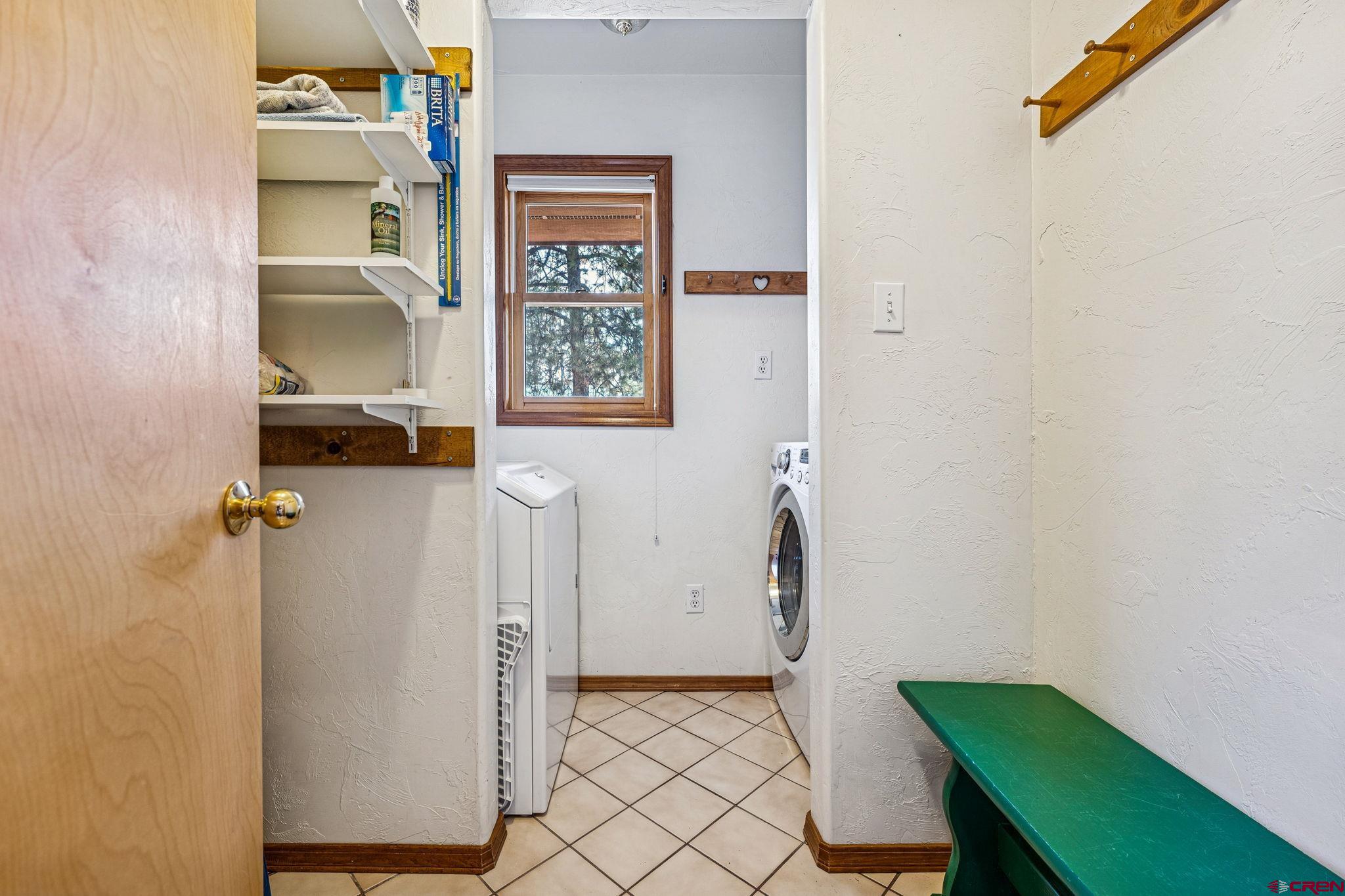 145 Cliffside Drive Durango, CO 81301 - Photo 12 of 43 a bathroom with a sink and a mirror