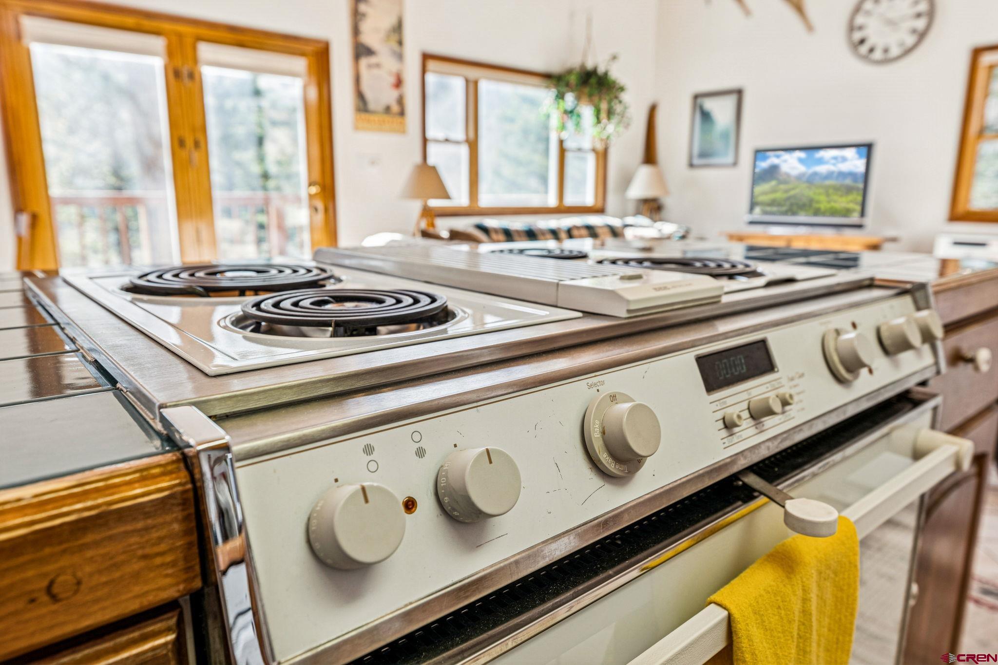 145 Cliffside Drive Durango, CO 81301 - Photo 20 of 43 a stove top oven sitting on top of a counter