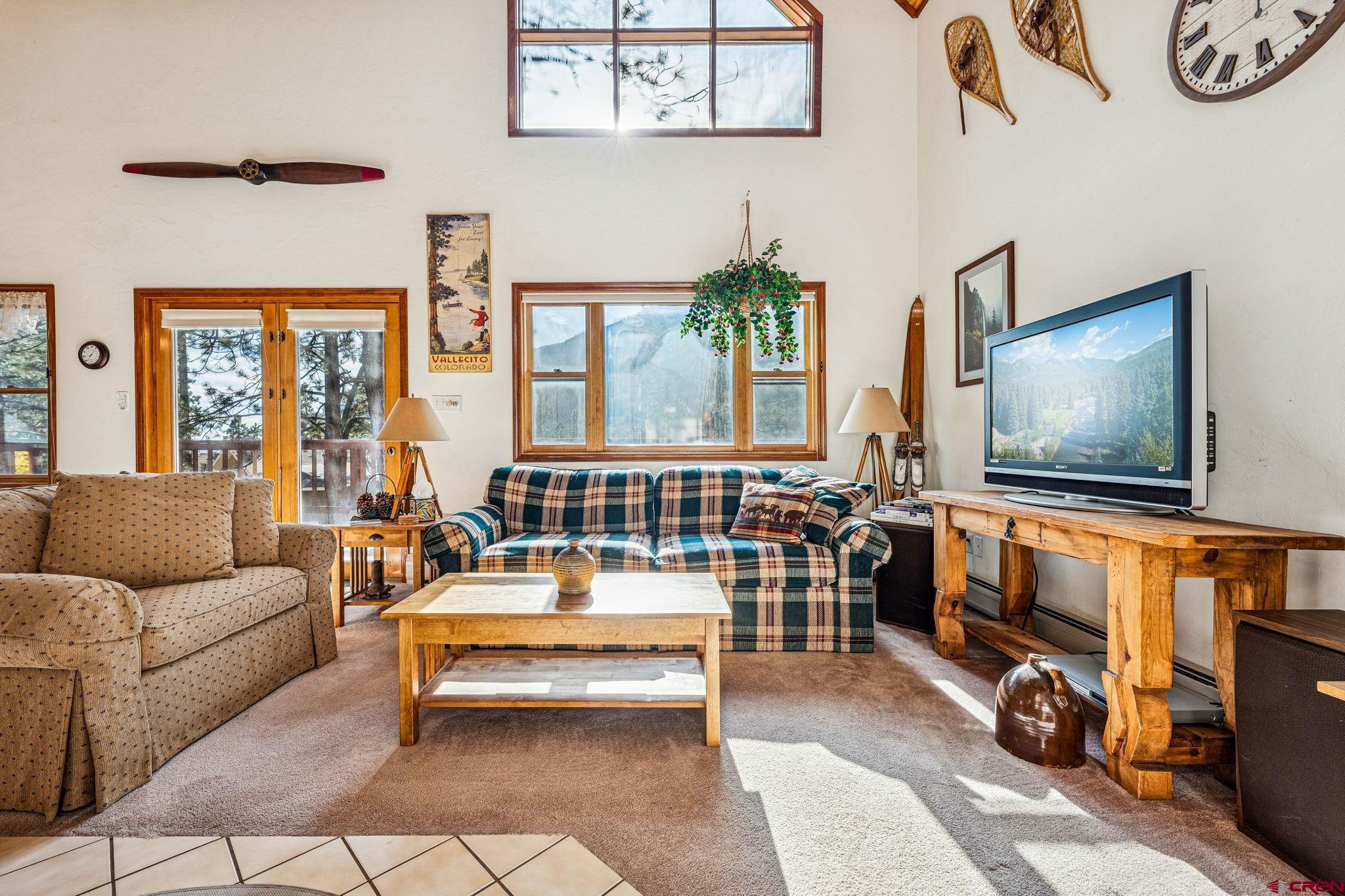 145 Cliffside Drive Durango, CO 81301 - Photo 23 of 43 a bedroom with furniture and a flat screen tv