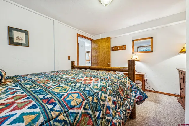 a view of a large building with a mountain in the background