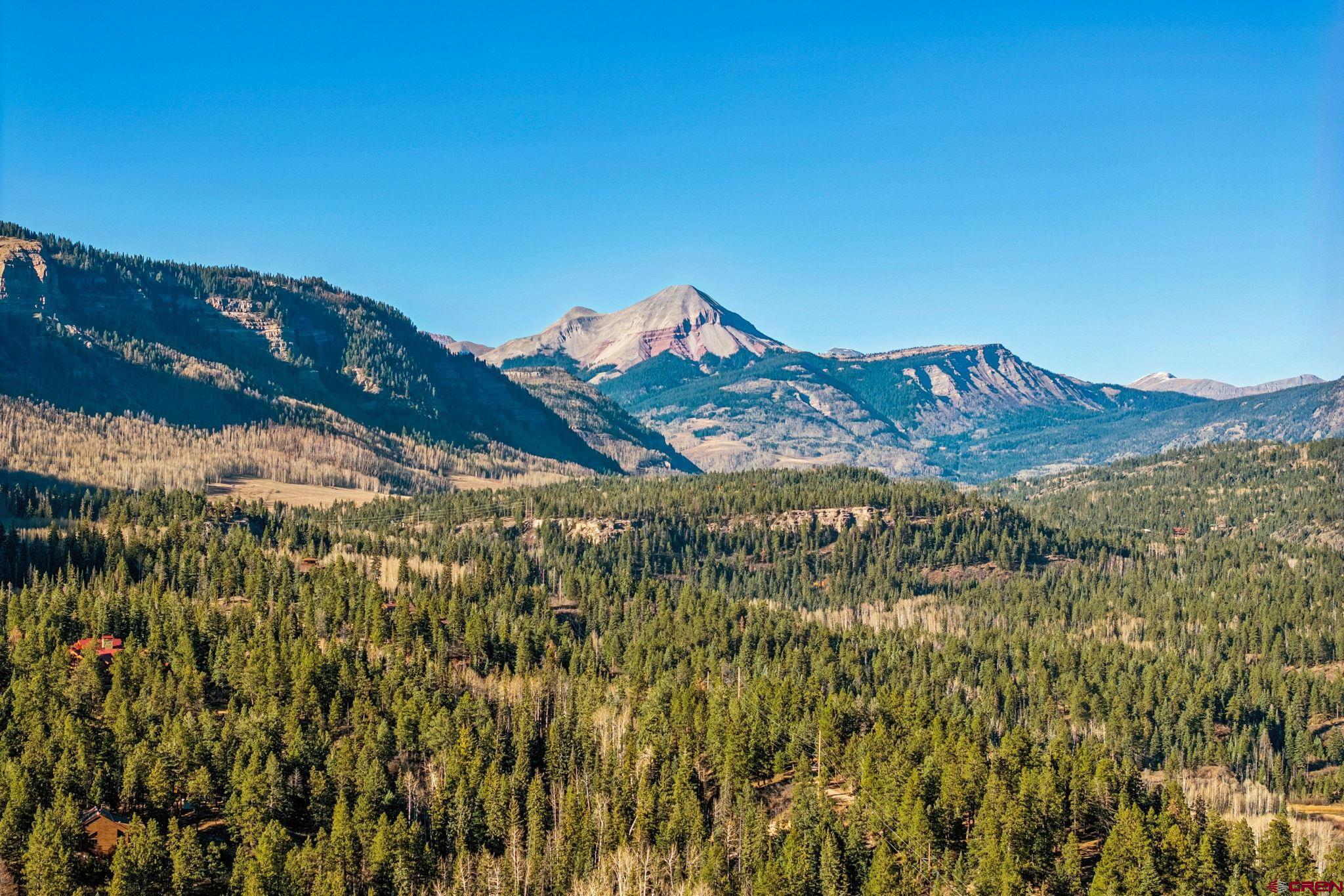 145 Cliffside Drive Durango, CO 81301 - Photo 43 of 43 a view of a large building with a mountain in the background