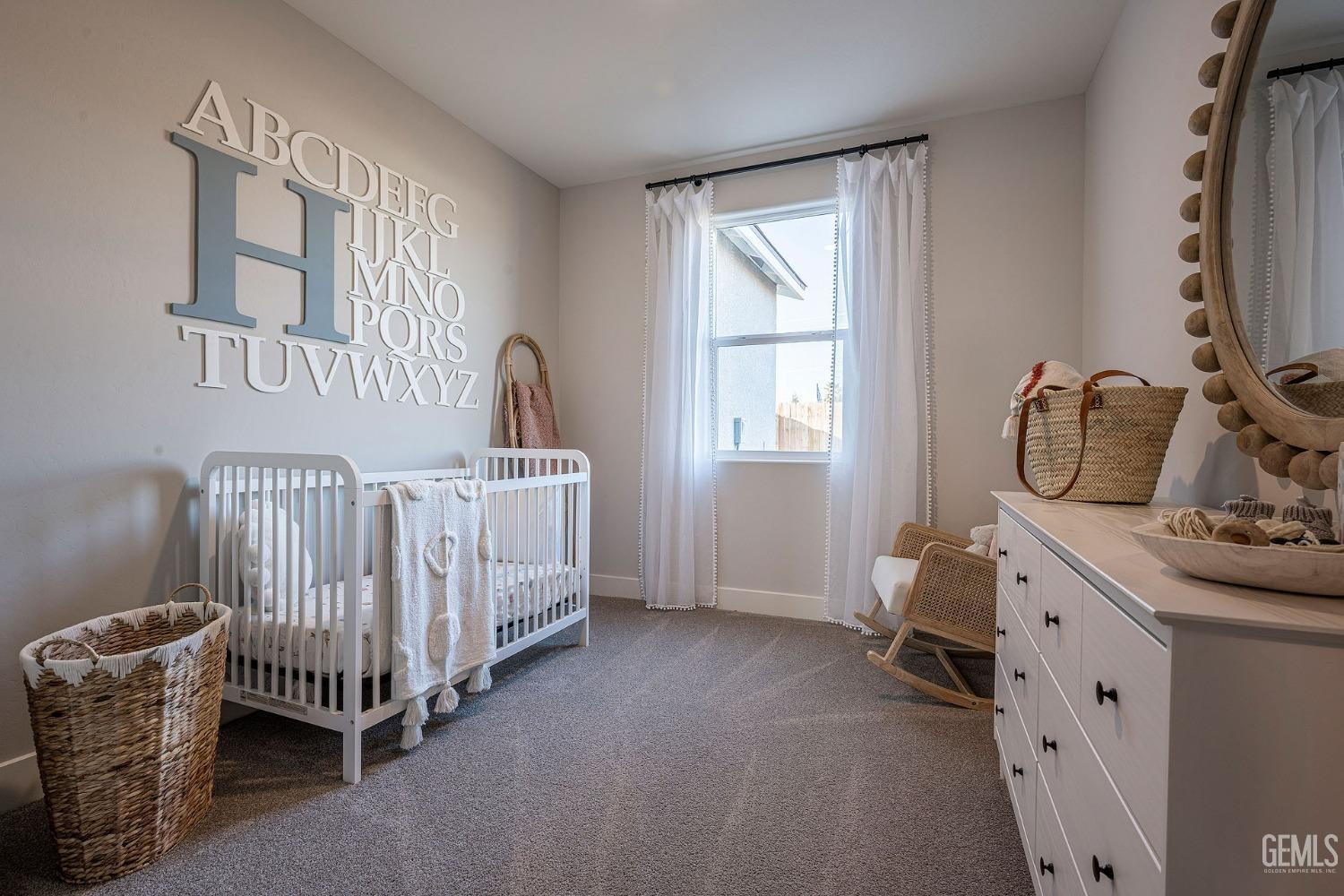 Undisclosed Address Bakersfield, CA 93311 - Photo 16 of 19 a room with a bed and a window