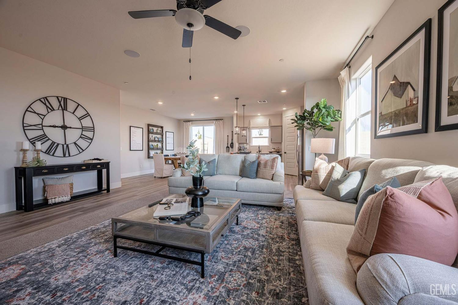 Undisclosed Address Bakersfield, CA 93311 - Photo 7 of 19 a living room with furniture and a fireplace
