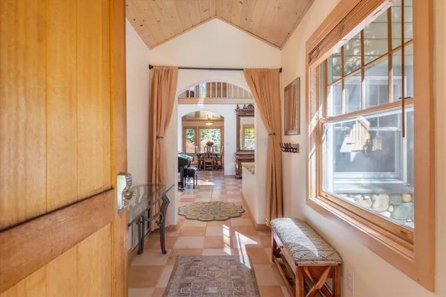 a view of a living room with a large window