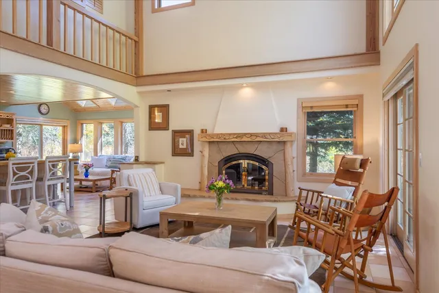 a view of a livingroom with furniture window and outside view
