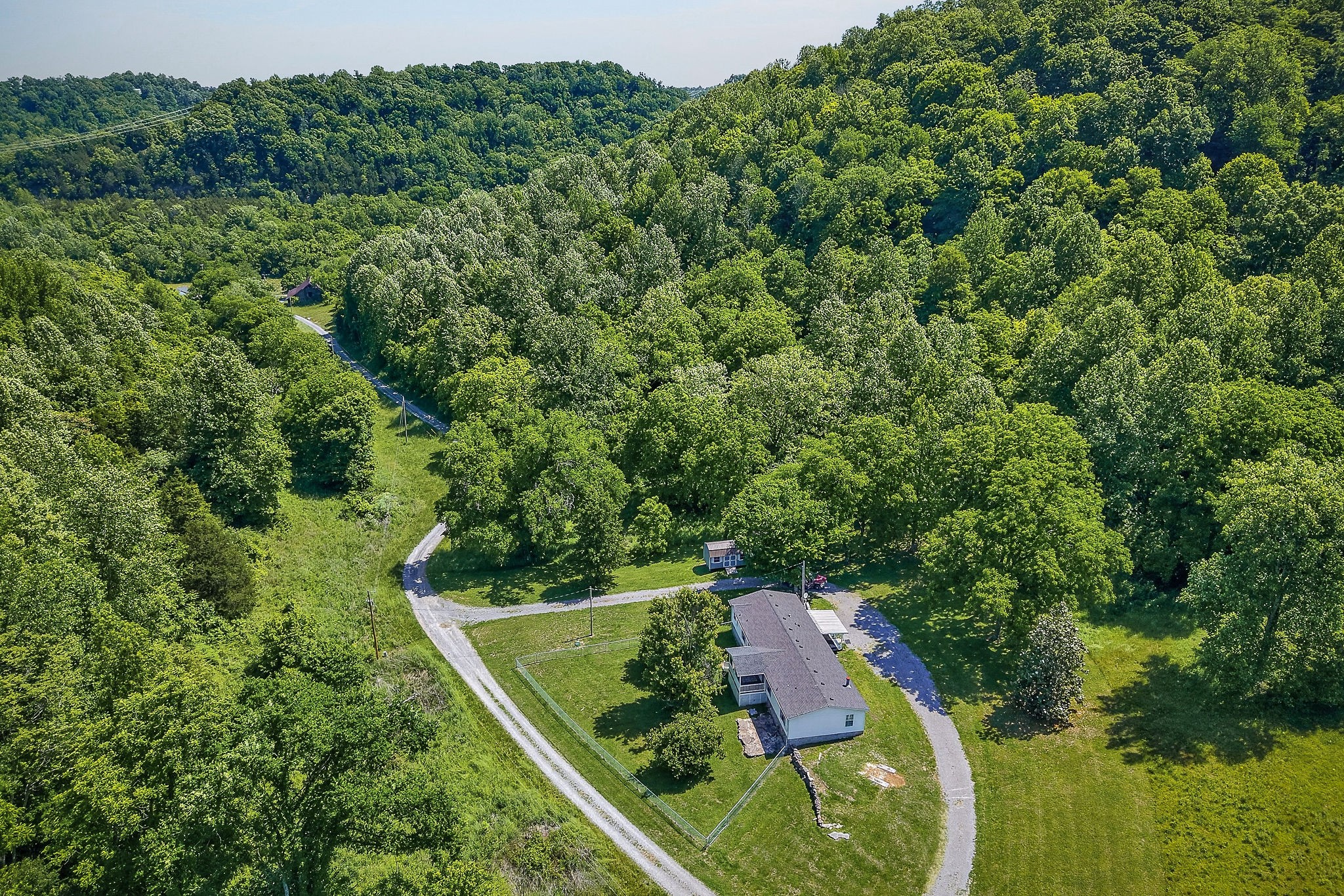 16130 Buffalo Valley Road Silver Point, TN 38582 - Photo 8 of 47 an aerial view of residential house with outdoor space and trees all around
