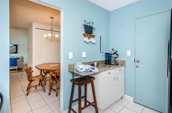 a workspace with furniture and window