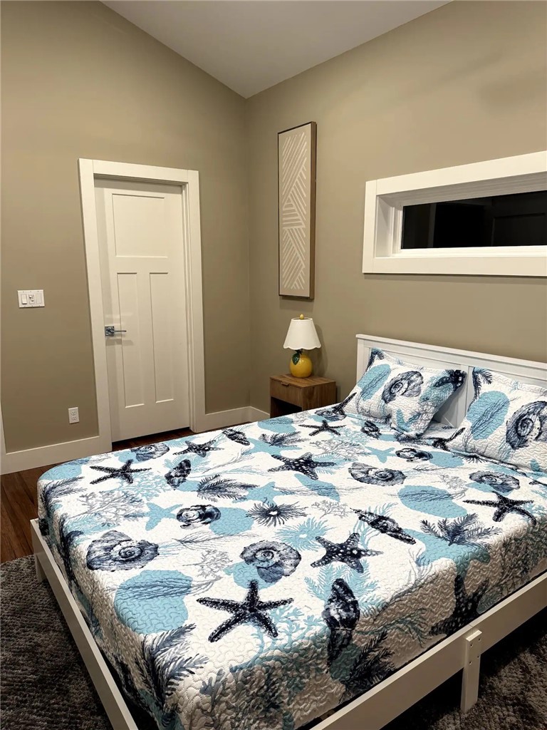 14310 Ridley Way Corpus Christi, TX 78418 - Photo 14 of 19 a bedroom with a bed and a window