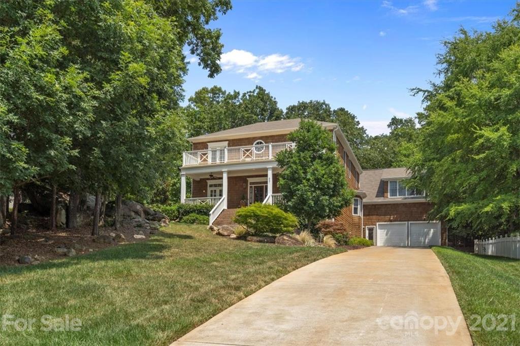 851 Stratford Run Drive Fort Mill, SC 29708 - Photo 1 of 48 a front view of a house with garden