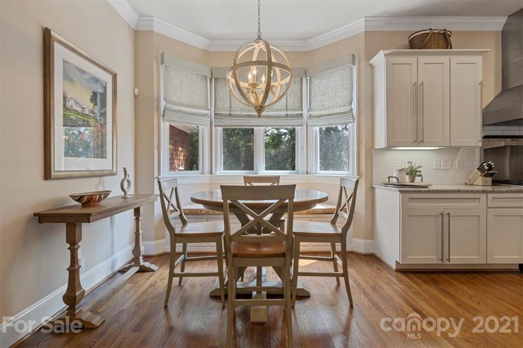851 Stratford Run Drive Fort Mill, SC 29708 - Photo 16 of 48 a view of a dining room with furniture window and wooden floor